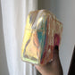 Louis Vuitton pochette Volga en PVC embossé Prism Monogram