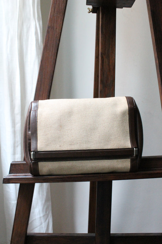 Trousse de toilette Hermès en toile beige et cuir marron