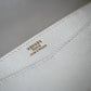 Sac à main Hermès modèle Odéon en cuir blanc et garniture plaquée or