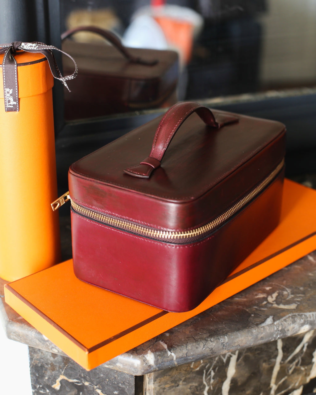 Trousse de toilette Hermès modèle Vanity PM en cuir bordeaux