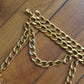 Chanel ceinture vintage en métal doré pendentif numéro 5