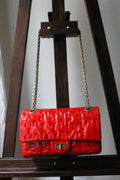 Chanel sac à main modèle 2.55 puzzle en cuir vernis