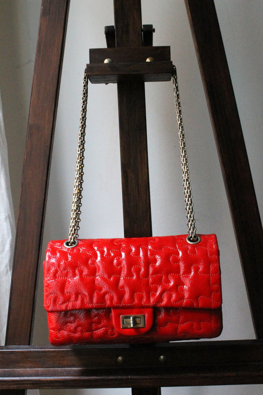 Chanel sac à main modèle 2.55 puzzle en cuir vernis