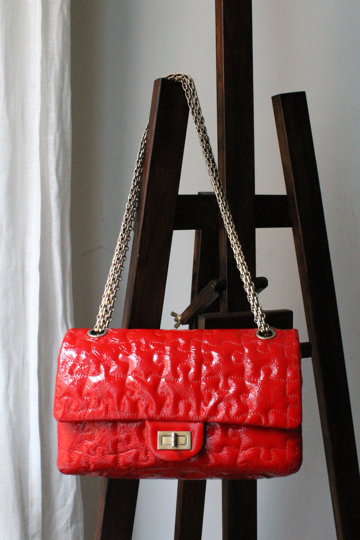Chanel sac à main modèle 2.55 puzzle en cuir vernis