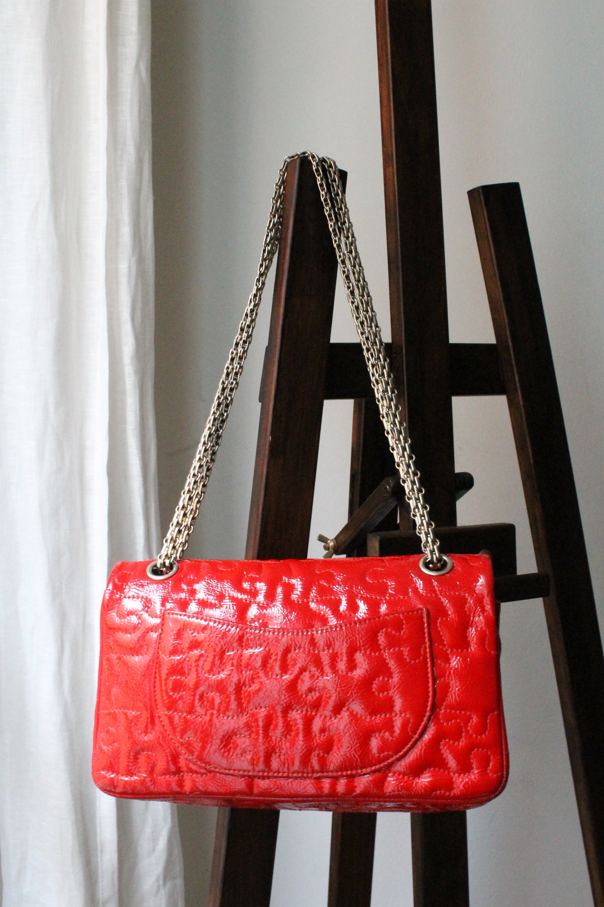 Chanel sac à main modèle 2.55 puzzle en cuir vernis
