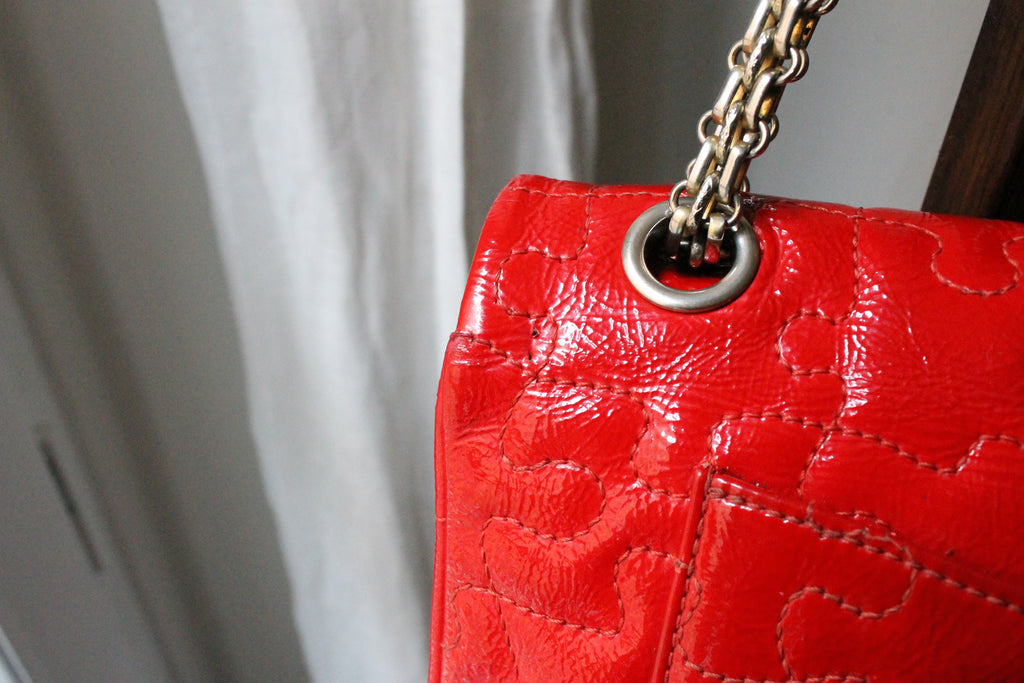 Chanel sac à main modèle 2.55 puzzle en cuir vernis