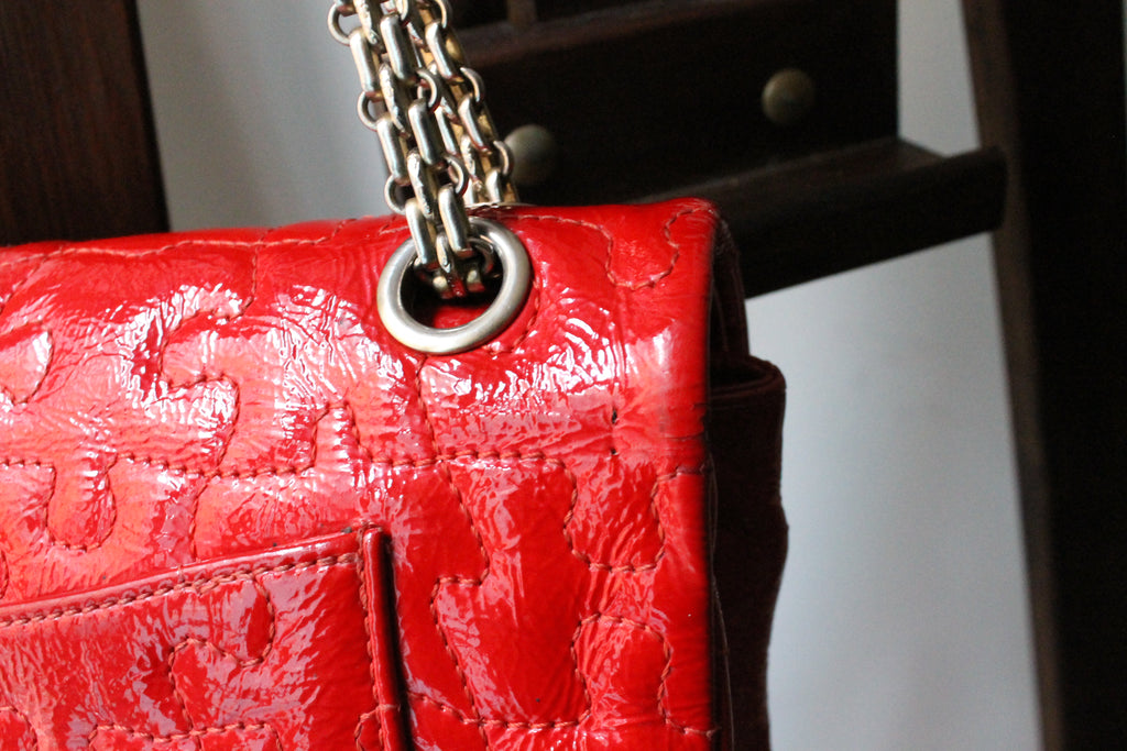 Chanel sac à main modèle 2.55 puzzle en cuir vernis