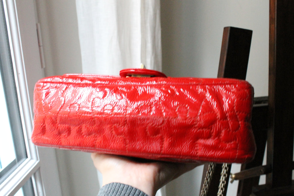 Chanel sac à main modèle 2.55 puzzle en cuir vernis