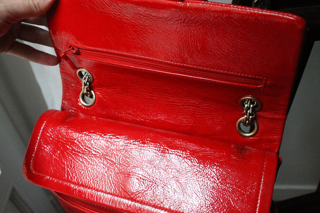 Chanel sac à main modèle 2.55 puzzle en cuir vernis