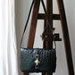 Céline sac à main modèle trio en cuir exotique (crocodile) noir