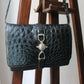 Céline sac à main modèle trio en cuir exotique (crocodile) noir
