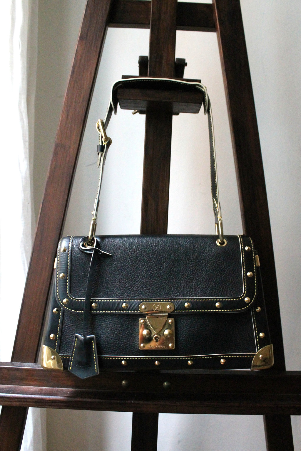 Louis Vuitton sac à main modèle Talentueux en cuir noir