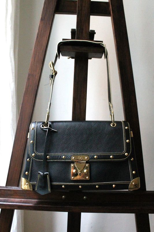 Louis Vuitton sac à main modèle Talentueux en cuir noir
