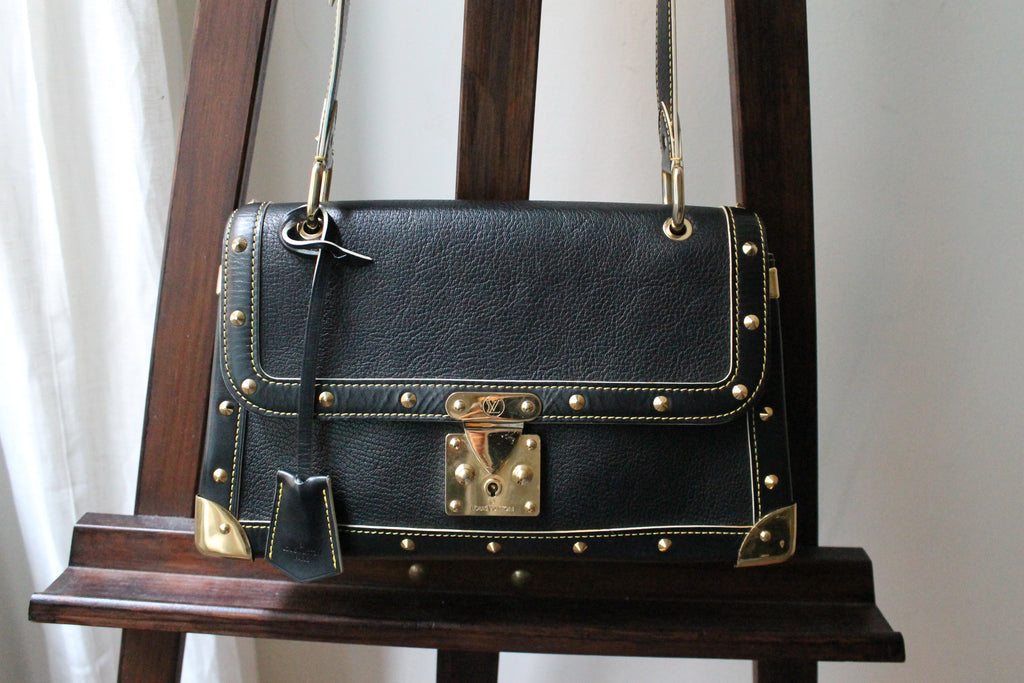 Louis Vuitton sac à main modèle Talentueux en cuir noir
