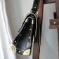 Louis Vuitton sac à main modèle Talentueux en cuir noir