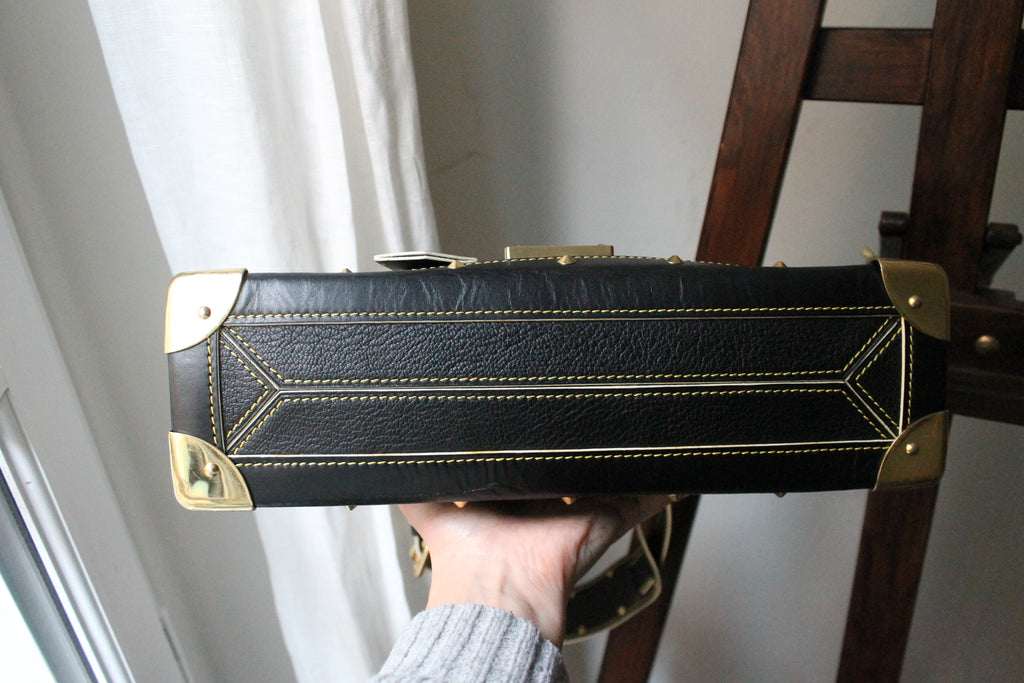 Louis Vuitton sac à main modèle Talentueux en cuir noir