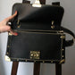 Louis Vuitton sac à main modèle Talentueux en cuir noir