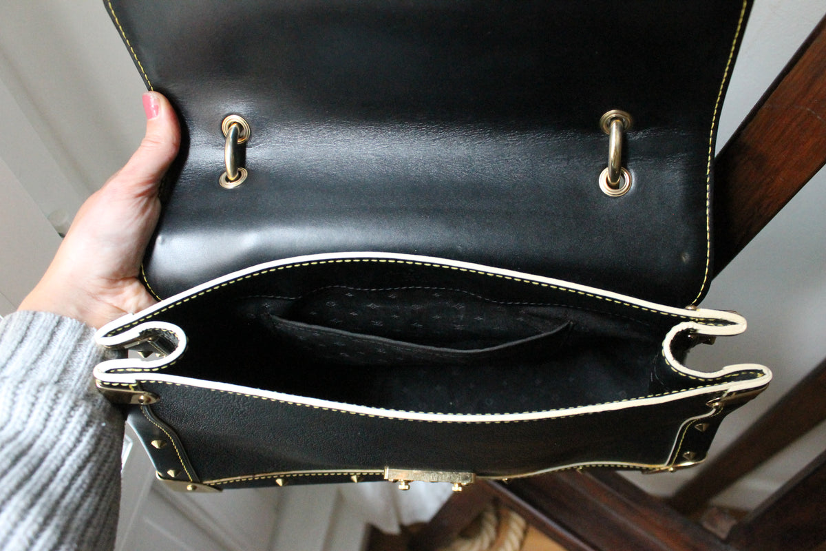 Louis Vuitton sac à main modèle Talentueux en cuir noir