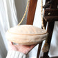 Chanel sac rond en daim rose poudré