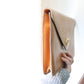 Céline pochette enveloppe en cuir camel et logo triomphe doré