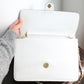 Chanel sac à main modèle Timeless vintage en cuir blanc crème