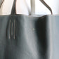 Hermès sac à main modèle Double sens en cuir gris et bleu