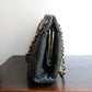 Chanel sac à main modèle Chevron en cuir noir vintage