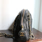 Chanel sac à main modèle caméra en cuir noir