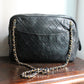 Chanel sac à main modèle caméra en cuir noir
