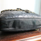 Chanel sac à main modèle caméra en cuir noir
