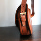 Hermès sac modèle Balle de Golf en cuir cognac