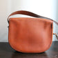 Hermès sac modèle Balle de Golf en cuir cognac