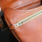 Hermès sac modèle Balle de Golf en cuir cognac