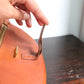 Hermès sac modèle Balle de Golf en cuir cognac