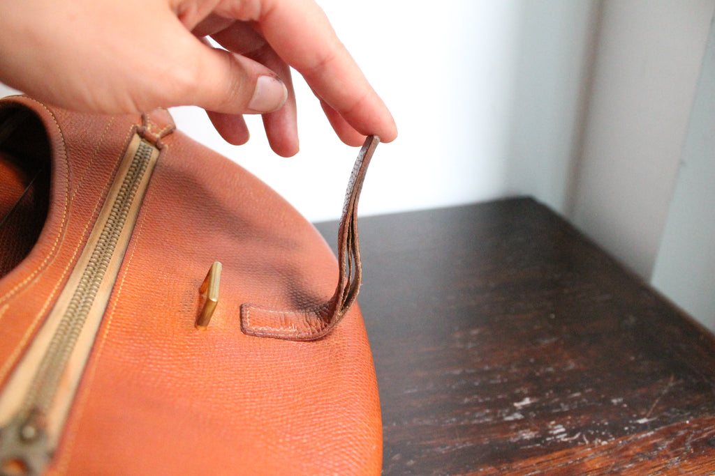 Hermès sac modèle Balle de Golf en cuir cognac