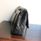Chanel sac à main modèle "2.55" vintage à double rabat en cuir noir