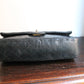 Chanel sac à main modèle "2.55" vintage à double rabat en cuir noir