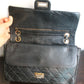 Chanel sac à main modèle "2.55" vintage à double rabat en cuir noir