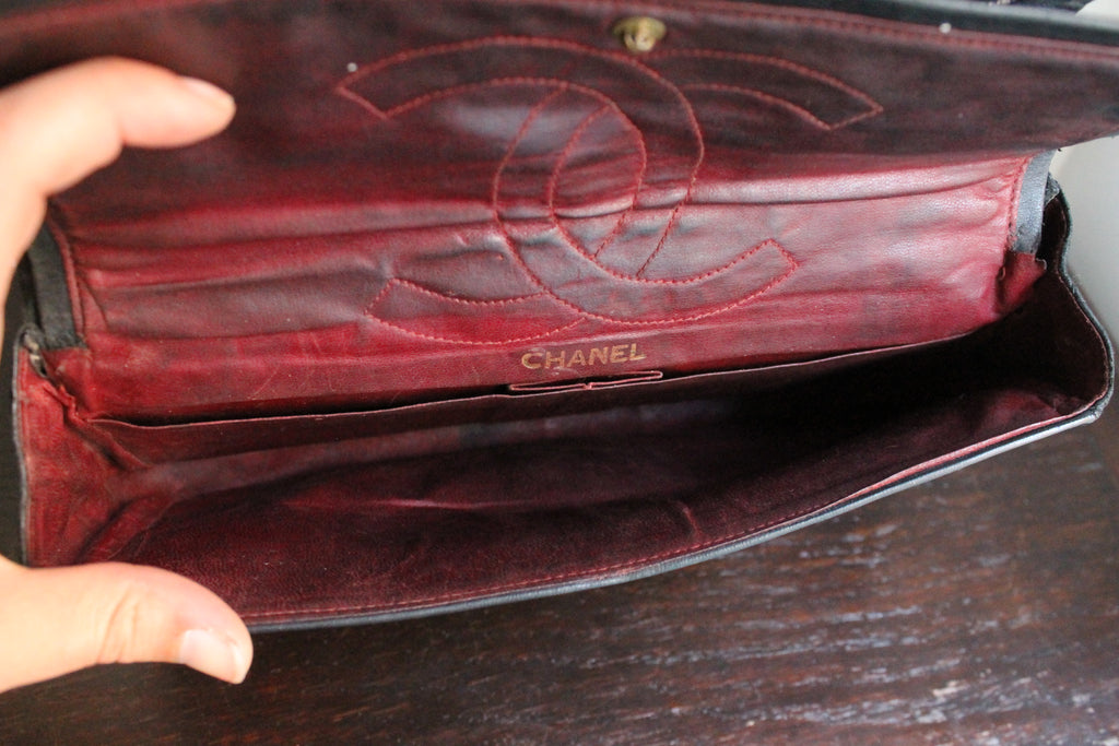 Chanel sac à main modèle "2.55" vintage à double rabat en cuir noir