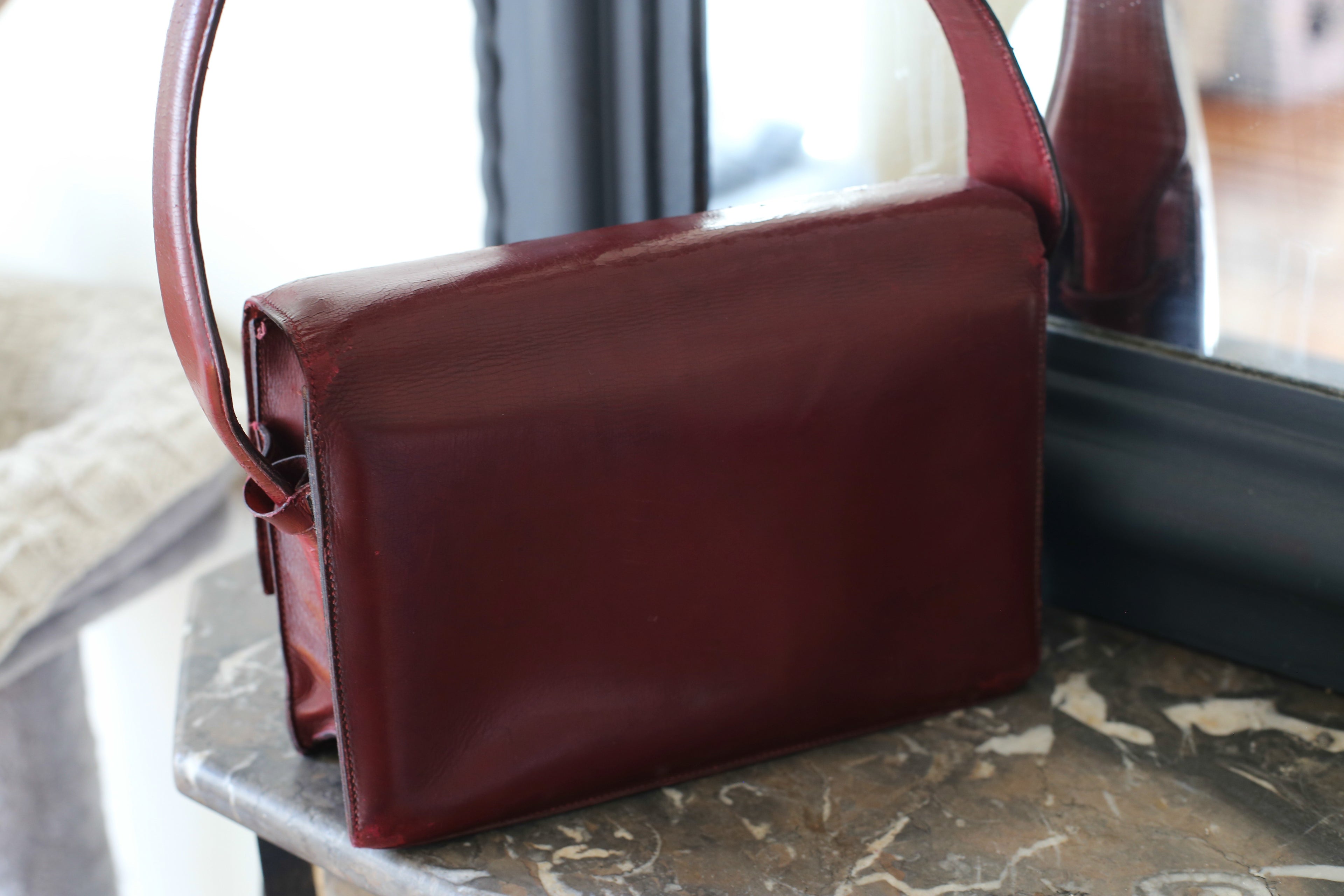 Hermès sac à main vintage modèle princesse en cuir bordeaux