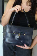 Hermès sac à main en cuir box bleu modèle Palonnier