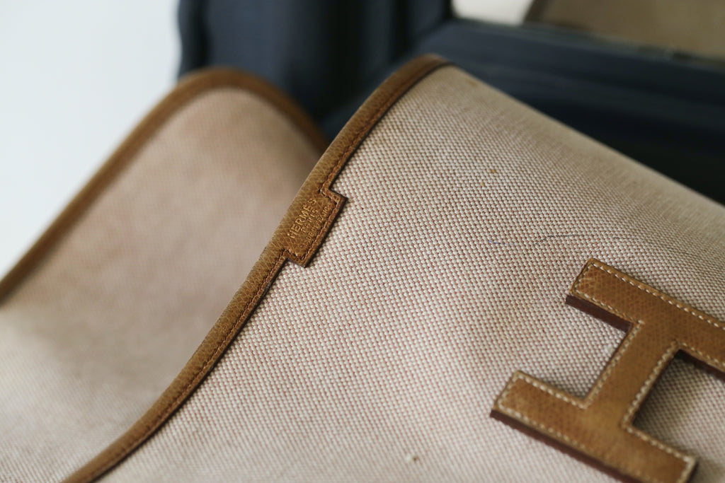 Hermès pochette en toile et cuir grainé modèle Jige