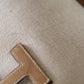 Hermès pochette en toile et cuir grainé modèle Jige