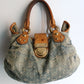 Louis Vuitton sac à main modèle Pleaty en denim bleu et cuir