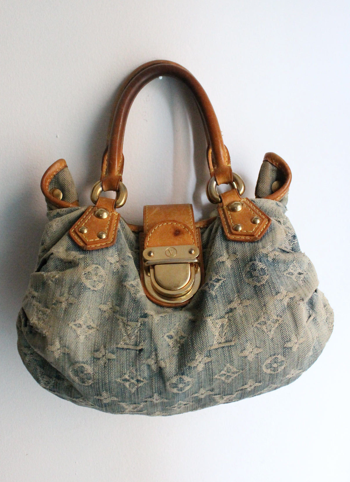 Louis Vuitton sac à main modèle Pleaty en denim bleu et cuir