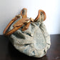 Louis Vuitton sac à main modèle Pleaty en denim bleu et cuir