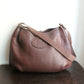 Hermès sac à main modèle Rodéo en cuir grainé marron