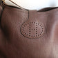 Hermès sac à main modèle Rodéo en cuir grainé marron