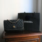 Chanel sac à main Timeless en cuir noir à rabat