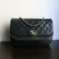 Chanel sac à main Timeless en cuir noir à rabat